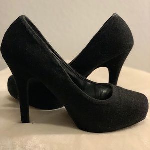 Black woolly high heels
